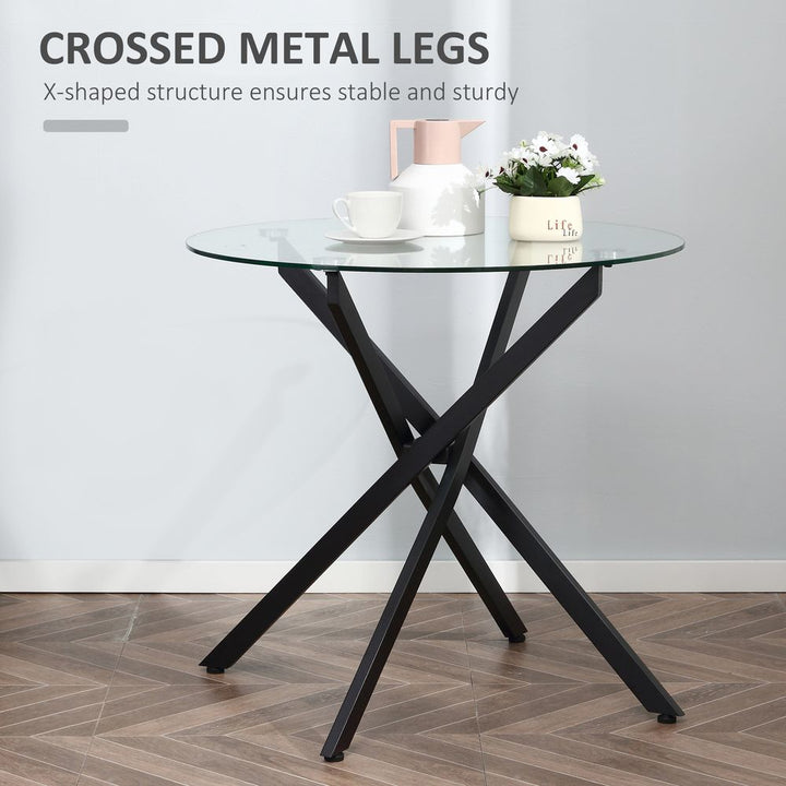 S0671080074 - Ella 80cm Round Clear Glass Dining table with Black Metal Legs - Coa Living